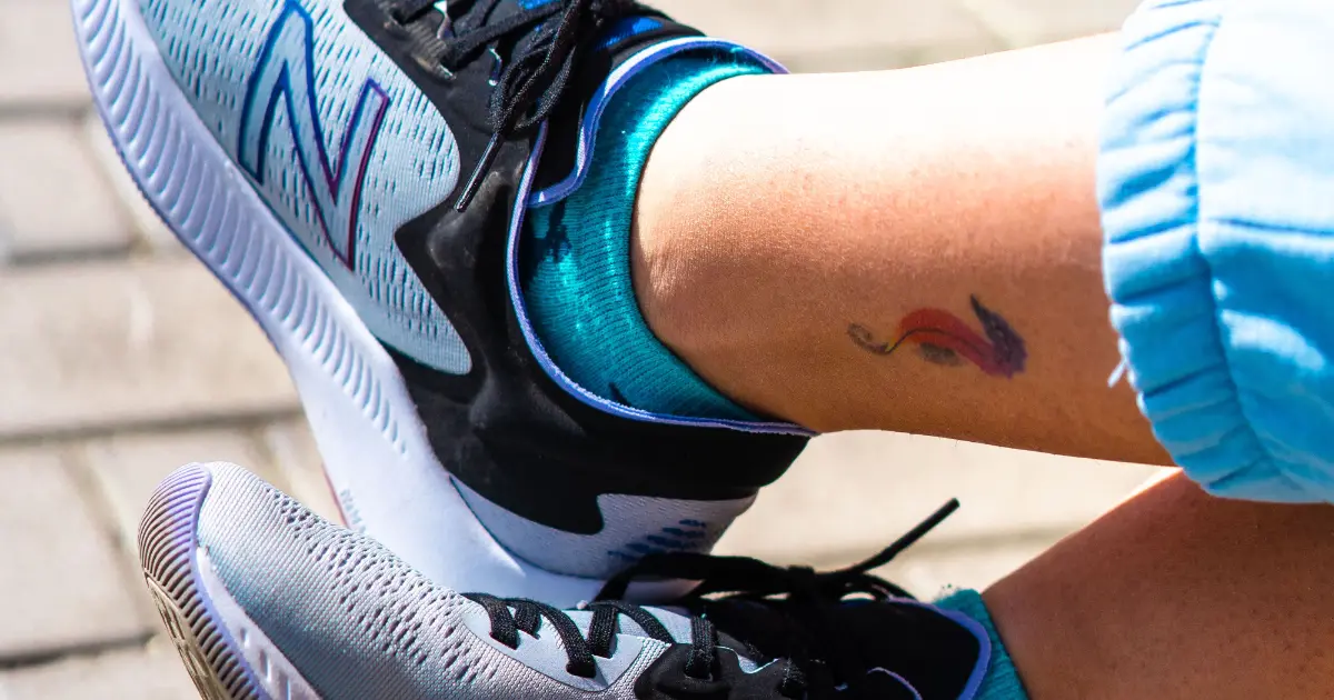 A woman’s trainers photographed outdoors — best New Balance shoes for women, Podiatrist Tested