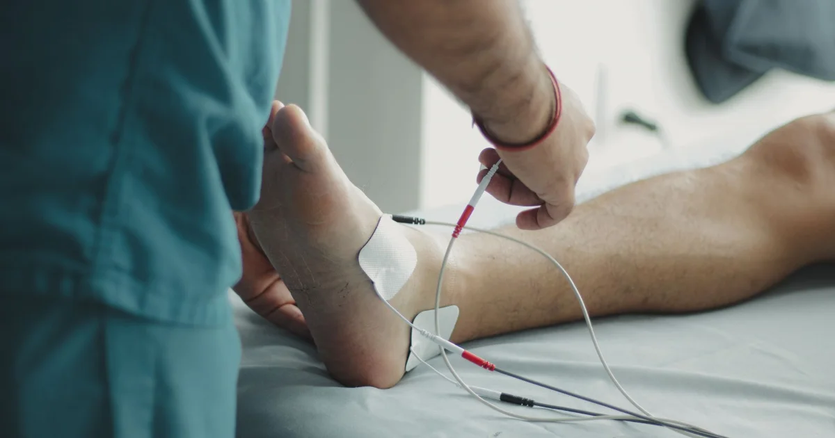 A clinician testing sensation on a patient foot - best shoes for Charcot foot, Podiatrist Tested