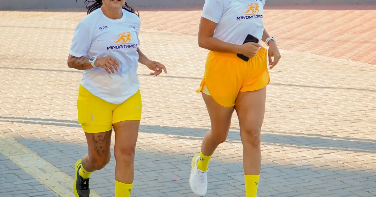 Two women running outdoors in athletic shoes — best shoes for plantar fasciitis for women, Podiatrist Tested